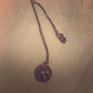 Silver sand dollar necklace from the Pearl Factory